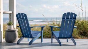 Coastal blue metal Adirondack chairs on a breezy seaside deck