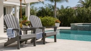 Polywood Adirondack chairs beside a bright residential swimming pool
